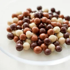 Céréales croustillantes enrobées de chocolat au lait, noir et blanc 80g