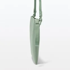 Sacoche à bandoulière déperlante détachable.