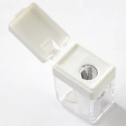 Taille crayon à réservoir